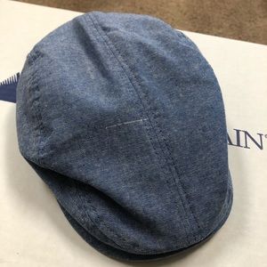 Gently worn baby boy flat cap.
